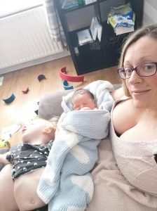 Sarah pictured with newborn and toddler - homebirth story