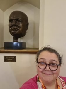 Amber Marshall with a bust of Churchill