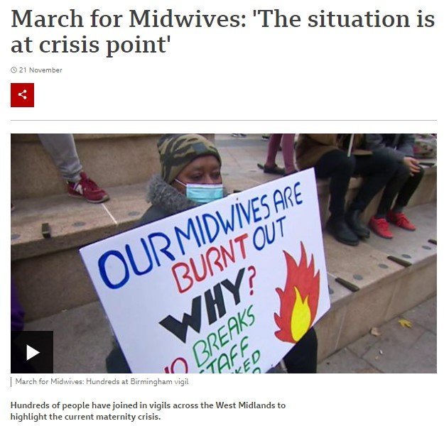 Masked woman sits on steps of a municipal building with a sign saying 'Our midwives are burnt out, Why?' - Midwives supporting alternative birth choices research